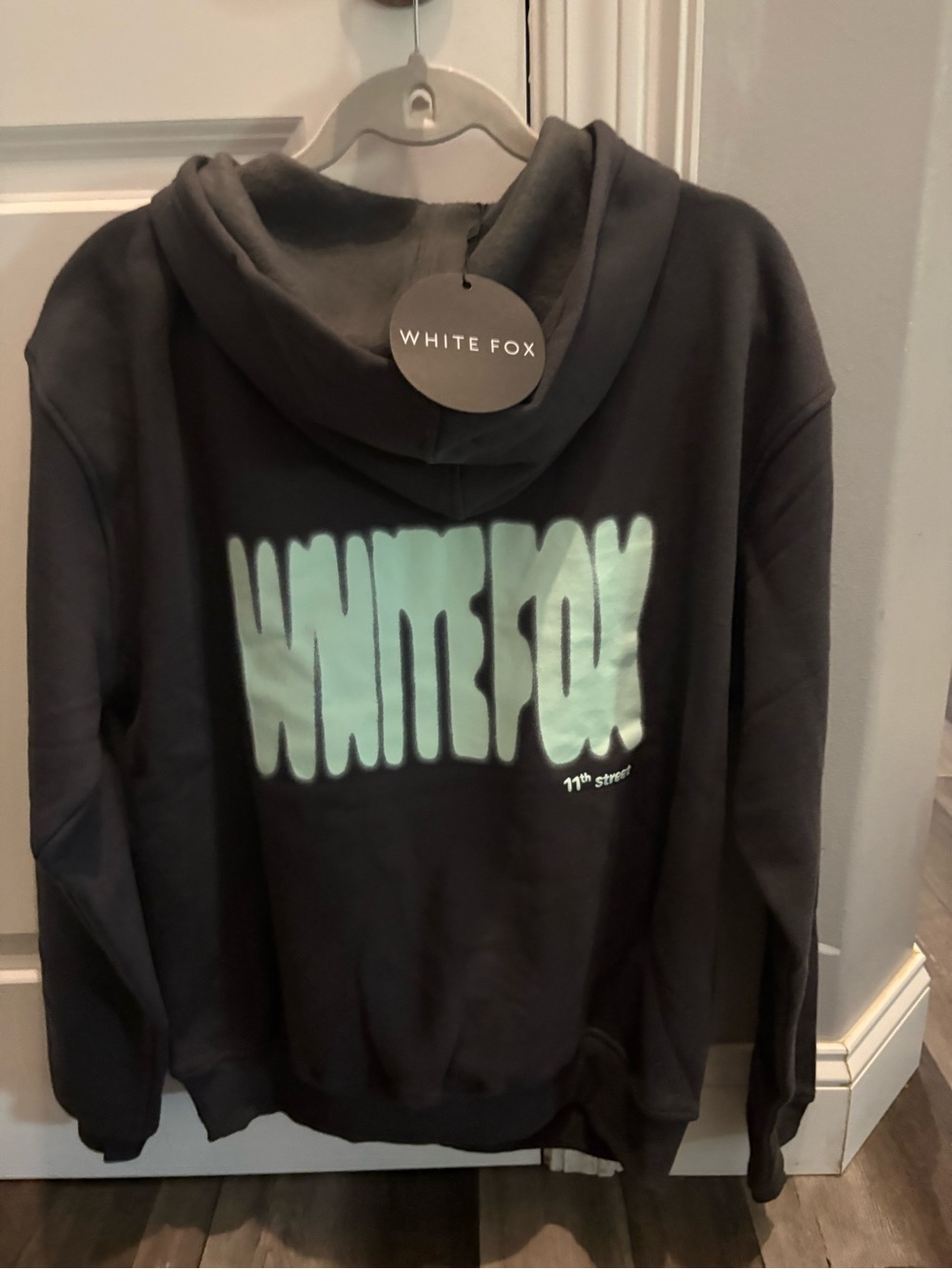 White Fox Boutique Black Hoodie with Mint Graphic